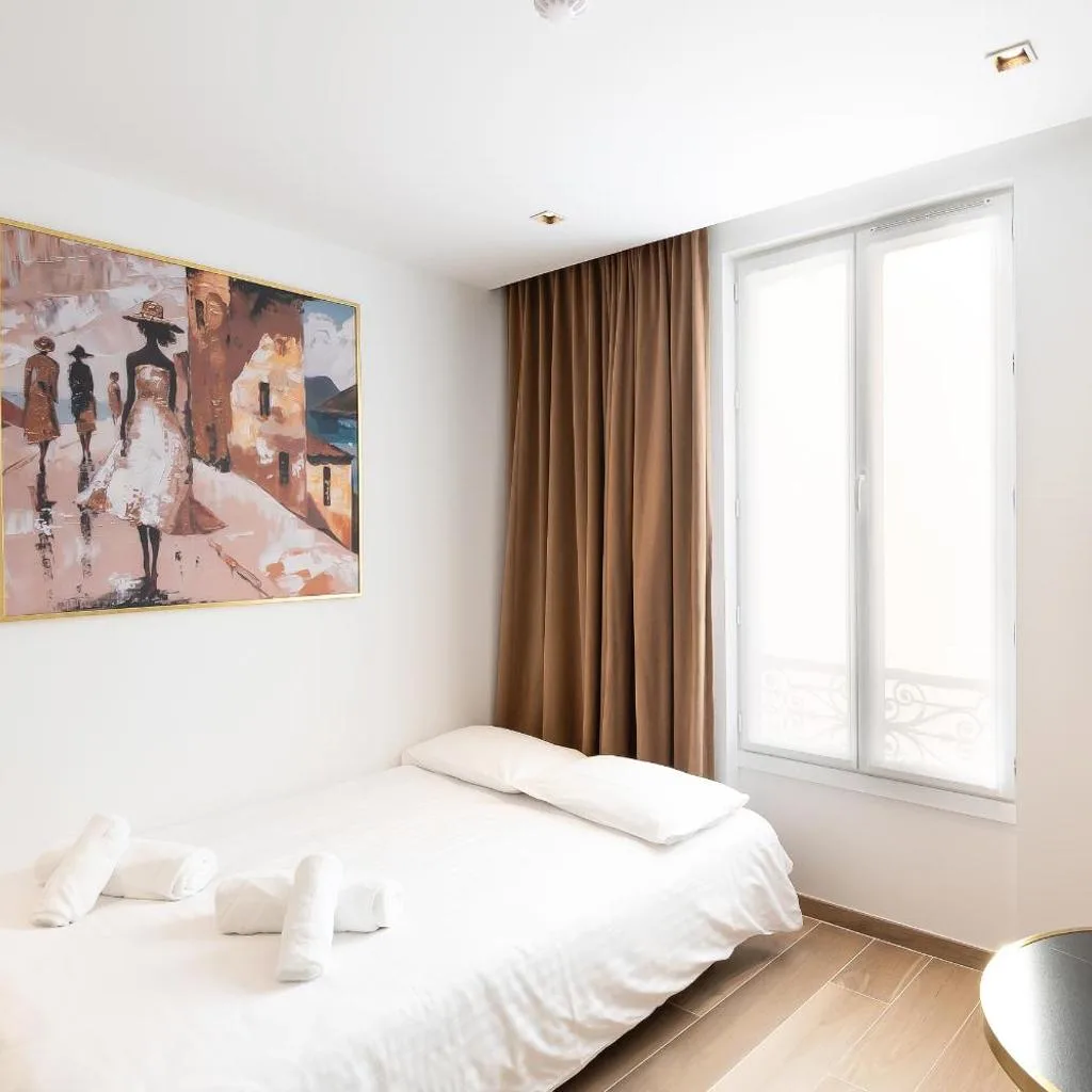 Les Suites Tour Eiffel - صورة 10
