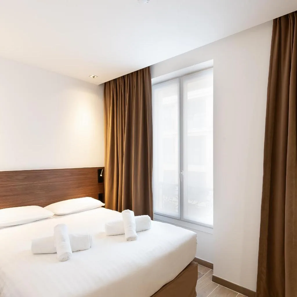 Les Suites Tour Eiffel - صورة 14