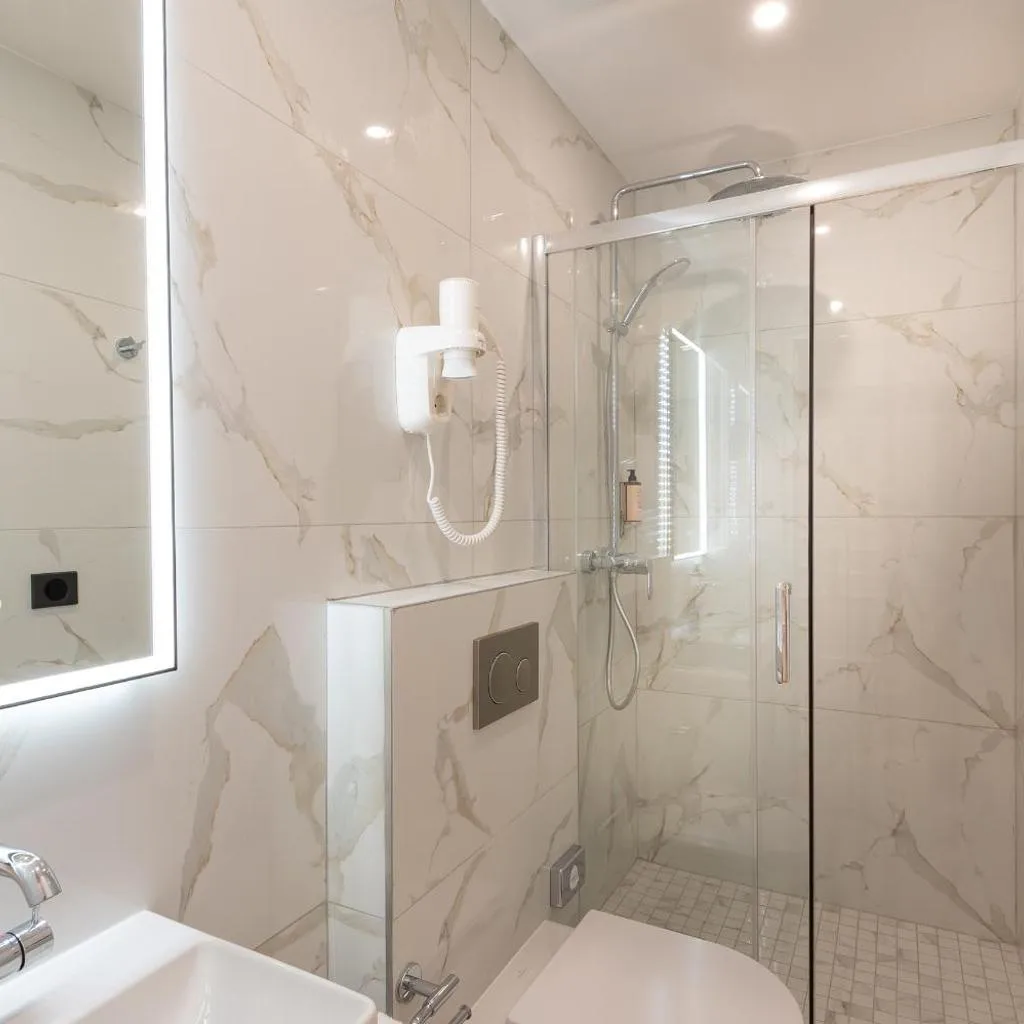 Les Suites Tour Eiffel - صورة 18