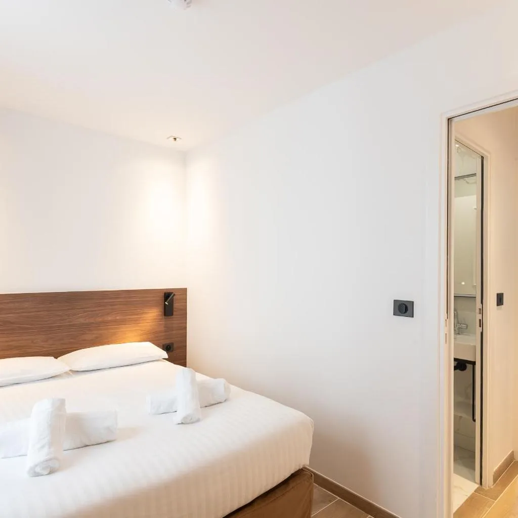 Les Suites Tour Eiffel - صورة 5