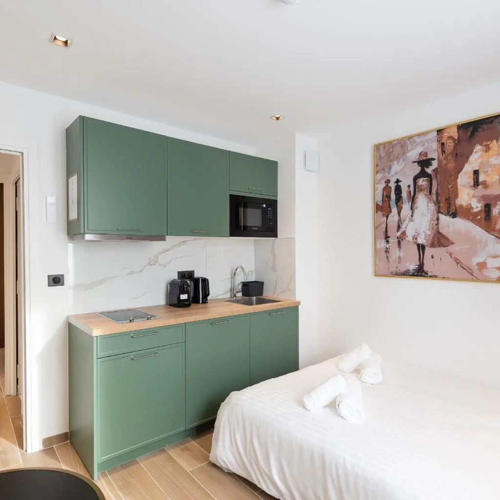 Les Suites Tour Eiffel - صورة 6