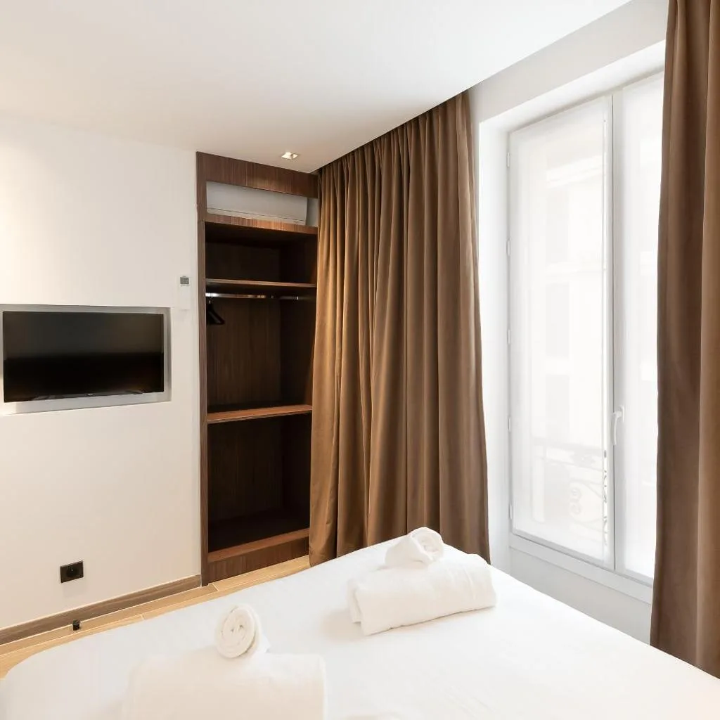Les Suites Tour Eiffel - صورة 8